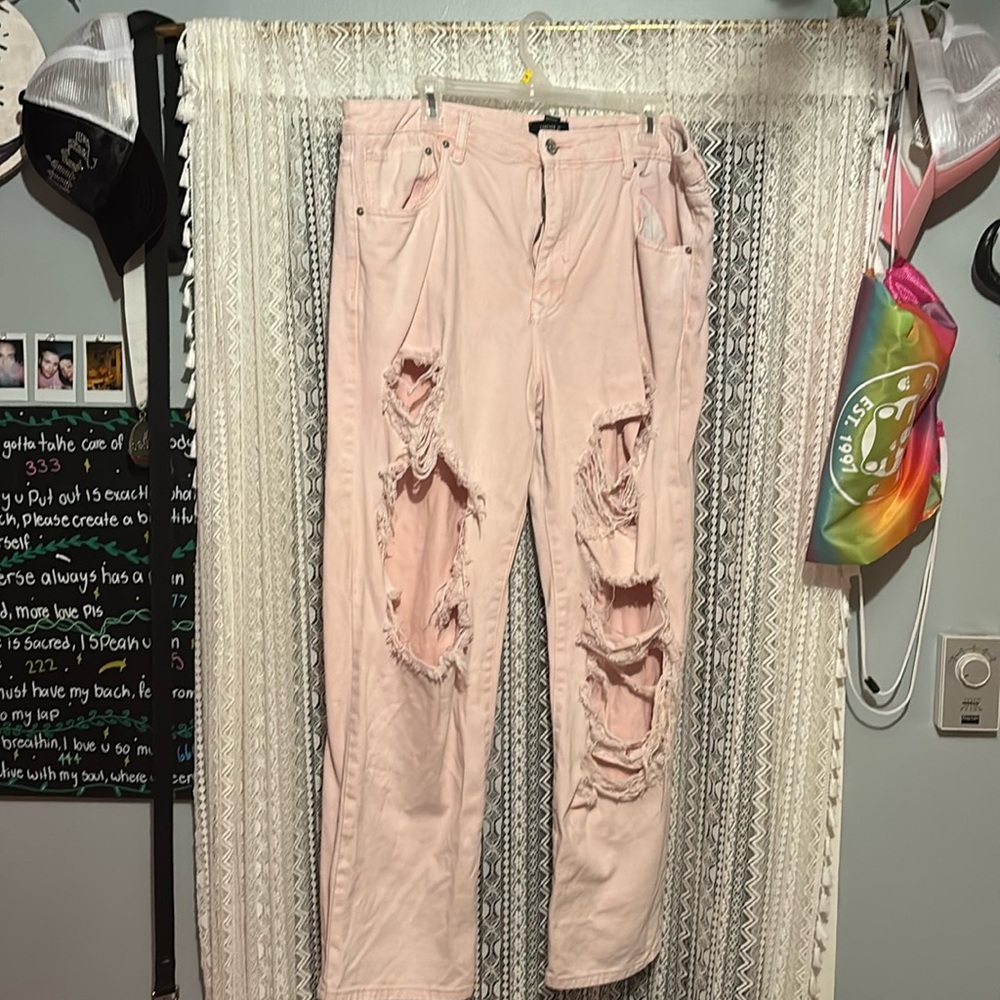 Pink ripped jeans